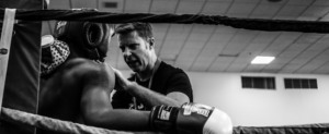 boxeur et son coach qui représentent le mentoring